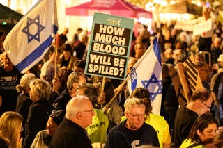 Israeli left-wing activists demonstrate in HaBima Square against the ongoing war with Iran and against the Israeli government in Tel Aviv on May 2